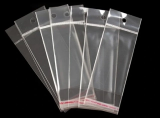 Celofánové sáčky 5x10 cm s lepicí lištou a závěsem 100ks/bal